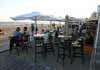 Costas autoriza a las terrazas del Oasis a colocar 29 mesas y 76 sillas sobre la arena de Maspalomas